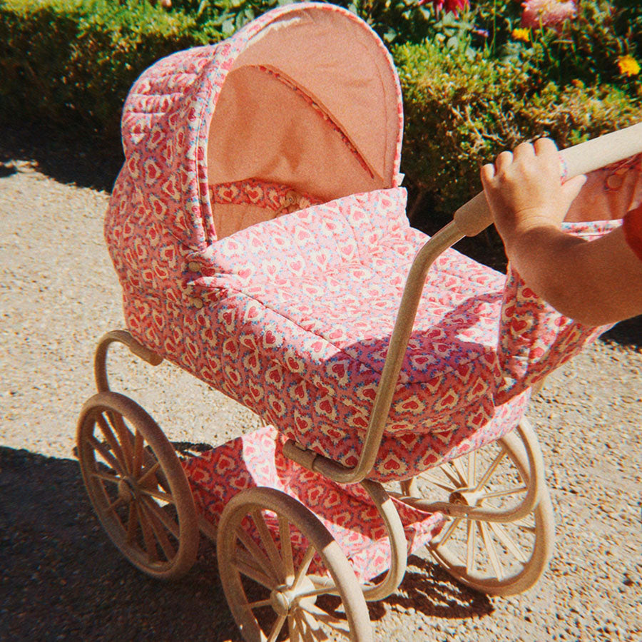 Minnie Puppenwagen, Felice Rose